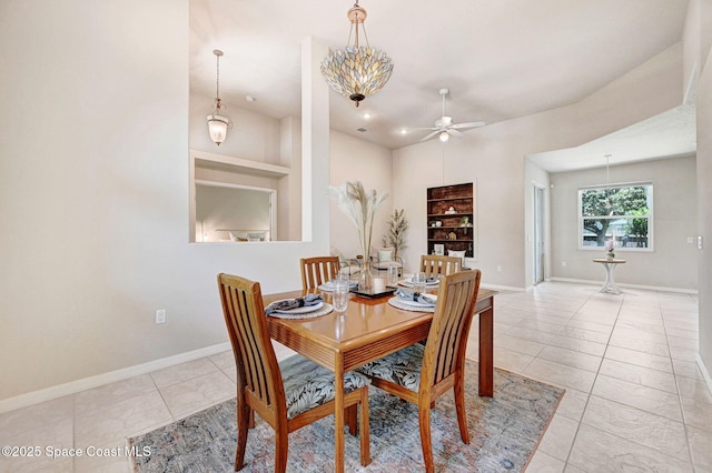 178 Cove Loop Dr, Merritt Island, FL 32953 - dining area featuring a ceiling fan, tile patterned floors, baseboards, and built in features