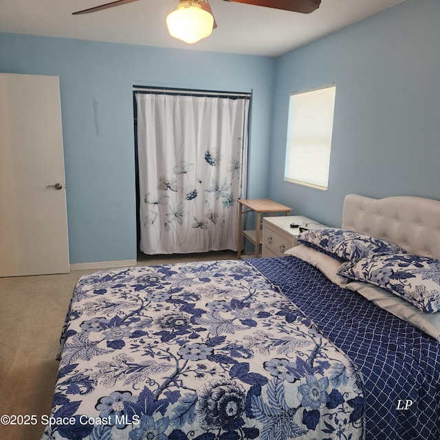 bedroom featuring carpet floors and a ceiling fan