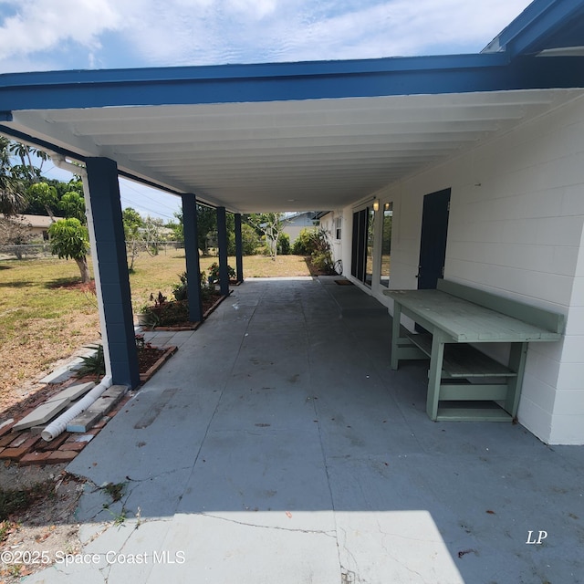 view of car parking with a carport