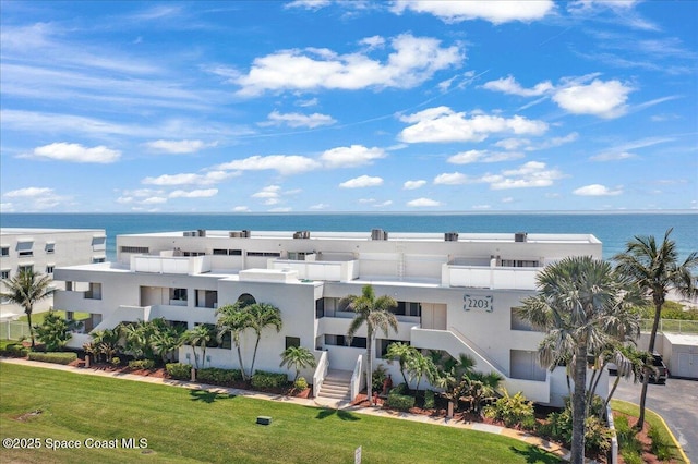2203 Atlantic St Unit 715, Melbourne Beach, FL 32951 - view of property with a water view and stairway