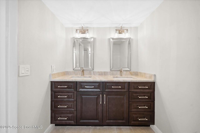 2203 Atlantic St Unit 715, Melbourne Beach, FL 32951 - full bathroom featuring double vanity, baseboards, and tile patterned flooring