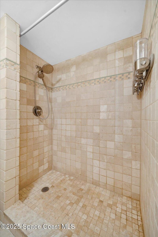 2203 Atlantic St Unit 715, Melbourne Beach, FL 32951 - bathroom featuring a tile shower