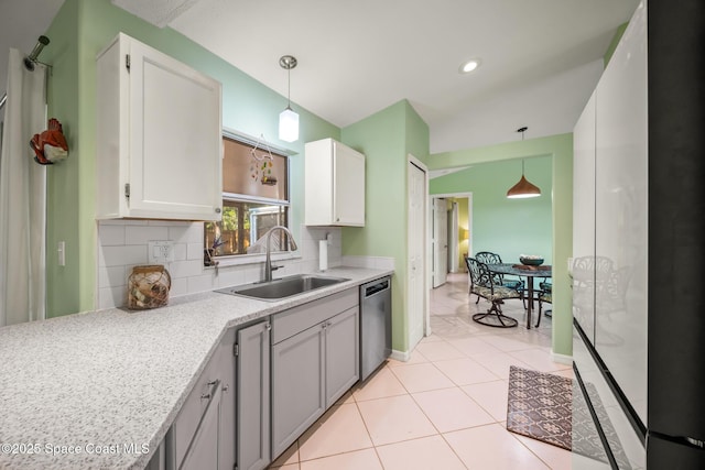 644 Sheridan Woods Dr, Melbourne, FL 32904 - kitchen featuring a sink, stainless steel dishwasher, backsplash, hanging light fixtures, and recessed lighting