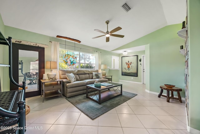644 Sheridan Woods Dr, Melbourne, FL 32904 - living room with lofted ceiling, ceiling fan, baseboards, and light tile patterned floors