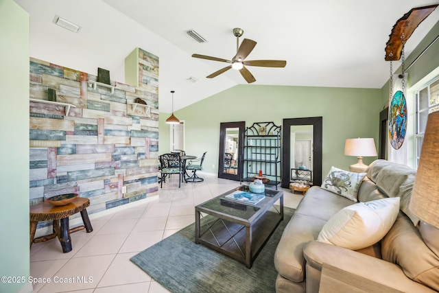 644 Sheridan Woods Dr, Melbourne, FL 32904 - tiled living room featuring lofted ceiling, ceiling fan, and baseboards
