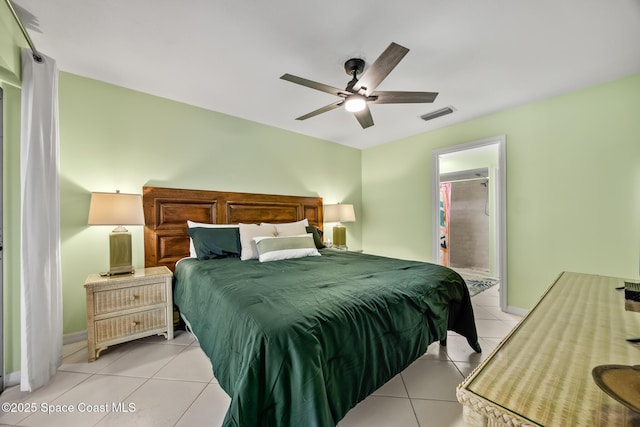 644 Sheridan Woods Dr, Melbourne, FL 32904 - bedroom featuring light tile patterned floors, a ceiling fan, baseboards, and connected bathroom