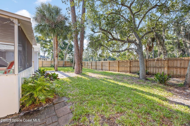 644 Sheridan Woods Dr, Melbourne, FL 32904 - view of yard featuring a sunroom