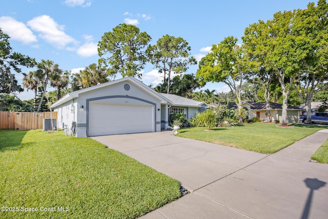 644 Sheridan Woods Dr, Melbourne, FL 32904 - ranch-style house with stucco siding, a garage, and driveway
