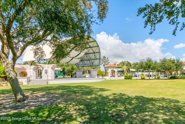137 Peachtree St, Cocoa, FL 32922 - view of community featuring a yard
