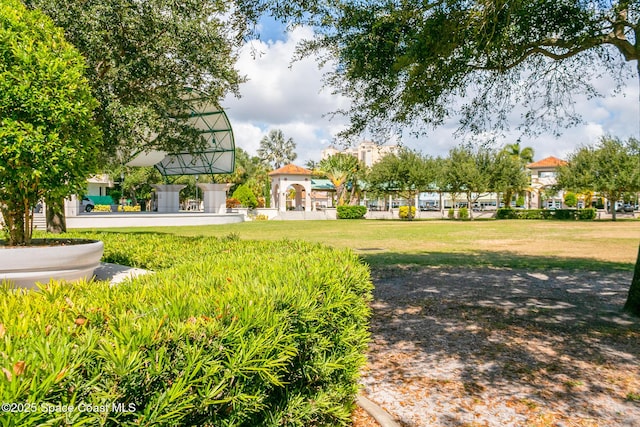 137 Peachtree St, Cocoa, FL 32922 - view of property's community with a yard