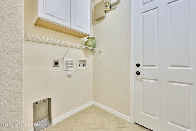 6227 Thames Pl, Vero Beach, FL 32966 - washroom featuring hookup for an electric dryer, cabinet space, hookup for a washing machine, light tile patterned flooring, and baseboards