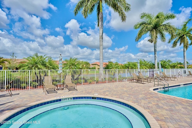 6227 Thames Pl, Vero Beach, FL 32966 - community pool with a patio area and a community hot tub