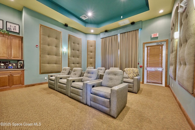 6227 Thames Pl, Vero Beach, FL 32966 - cinema featuring light colored carpet, baseboards, a raised ceiling, and recessed lighting