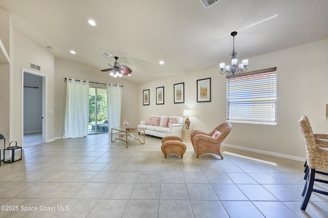 6227 Thames Pl, Vero Beach, FL 32966 - living room featuring a chandelier, a ceiling fan, light tile patterned floors, recessed lighting, and baseboards
