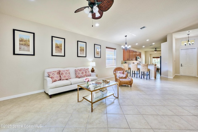 6227 Thames Pl, Vero Beach, FL 32966 - living room with a chandelier, ceiling fan, light tile patterned flooring, and recessed lighting