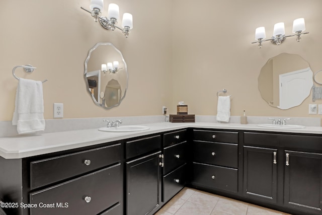bathroom featuring tile patterned flooring and double vanity