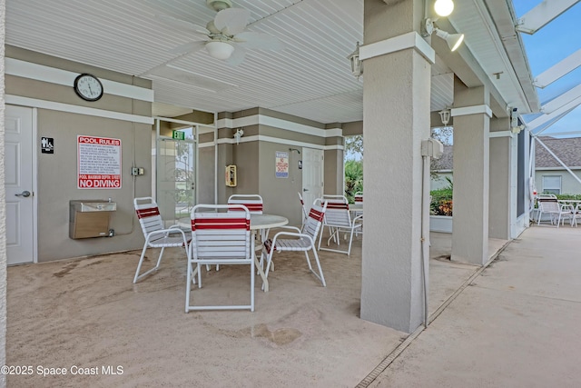view of patio / terrace with a ceiling fan and outdoor dining area