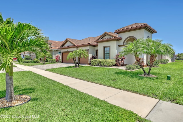 2922 Addison Dr, Melbourne, FL 32940 - mediterranean / spanish-style home featuring an attached garage, driveway, stucco siding, a tile roof, and a front yard