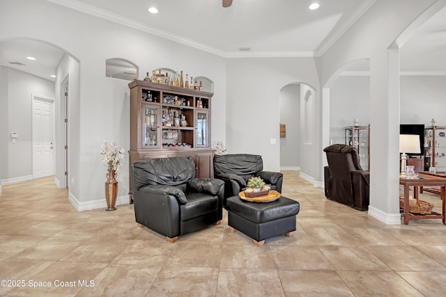 2922 Addison Dr, Melbourne, FL 32940 - living area with arched walkways, crown molding, recessed lighting, and baseboards