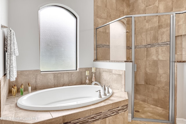 2922 Addison Dr, Melbourne, FL 32940 - bathroom featuring a garden tub and a stall shower