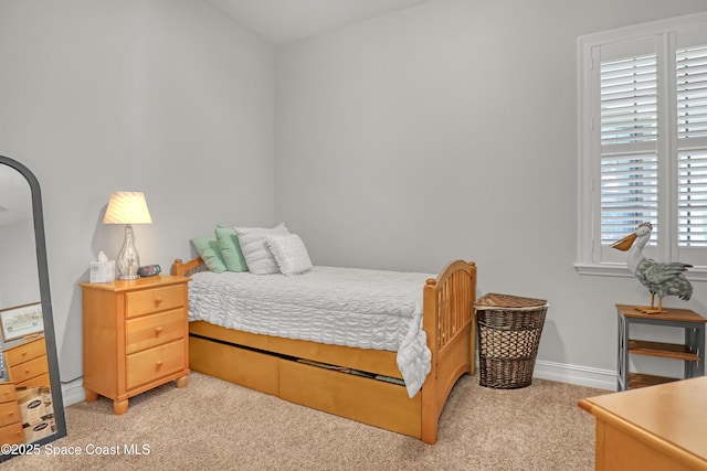 2922 Addison Dr, Melbourne, FL 32940 - bedroom with light carpet and baseboards