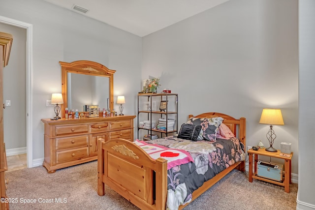 2922 Addison Dr, Melbourne, FL 32940 - bedroom featuring light colored carpet and baseboards