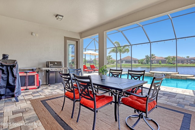 2922 Addison Dr, Melbourne, FL 32940 - view of patio / terrace with grilling area, an outdoor pool, a lanai, a residential view, and a water view