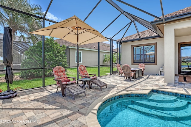 2922 Addison Dr, Melbourne, FL 32940 - outdoor pool with glass enclosure and a patio