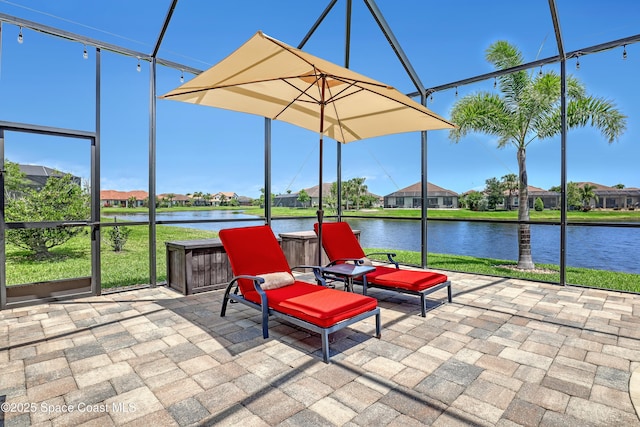 2922 Addison Dr, Melbourne, FL 32940 - view of patio featuring a residential view, a water view, and a lanai
