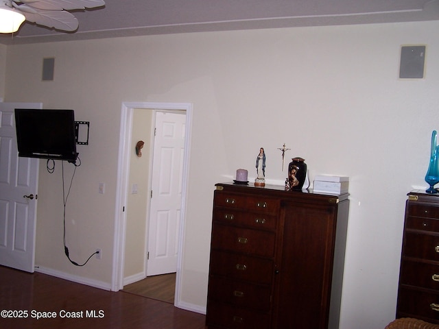4077 Green Oak Dr, Melbourne, FL 32901 - bedroom featuring dark wood finished floors and baseboards