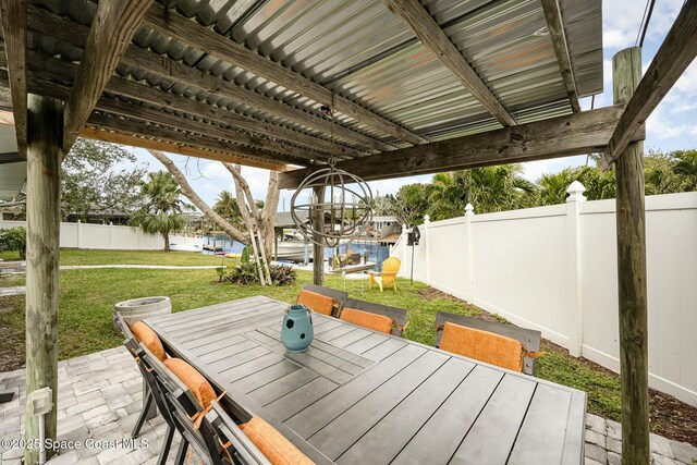 407 Sandpiper Dr, Satellite Beach, FL 32937 - view of patio featuring outdoor dining space and a water view