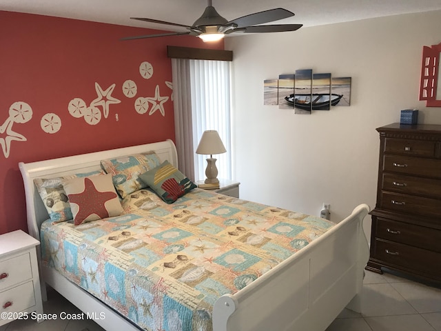 bedroom with light tile patterned flooring and ceiling fan