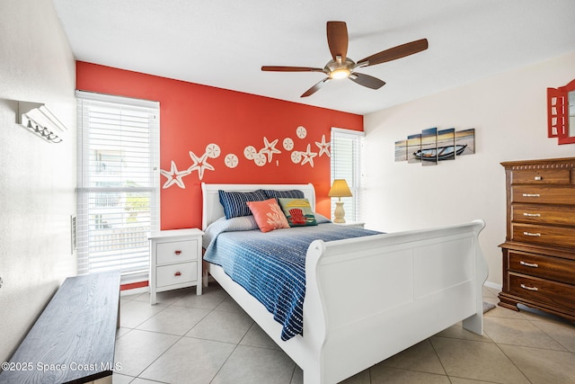 2625 S Atlantic Ave Unit 17, Cocoa Beach, FL 32931 - bedroom featuring tile patterned flooring and a ceiling fan