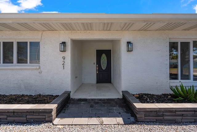 921 S Orlando Ave, Cocoa Beach, FL 32931 - property entrance with stucco siding