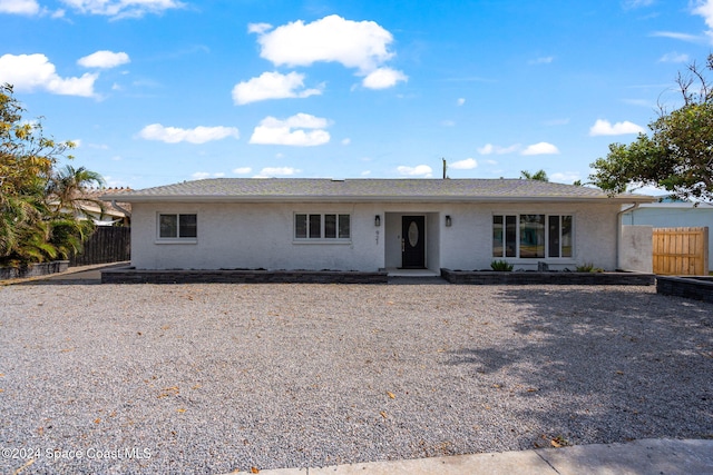 921 S Orlando Ave, Cocoa Beach, FL 32931 - ranch-style house featuring fence