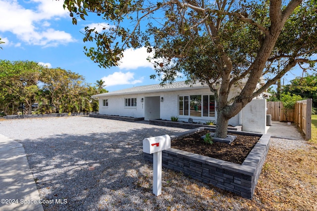 921 S Orlando Ave, Cocoa Beach, FL 32931 - ranch-style home with fence