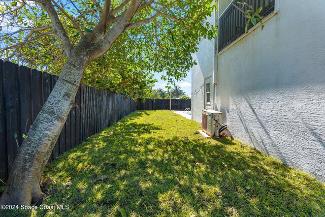 921 S Orlando Ave, Cocoa Beach, FL 32931 - view of yard featuring ac unit