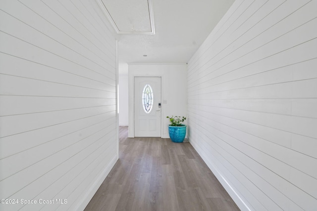 921 S Orlando Ave, Cocoa Beach, FL 32931 - entryway featuring wooden walls and dark wood-style floors