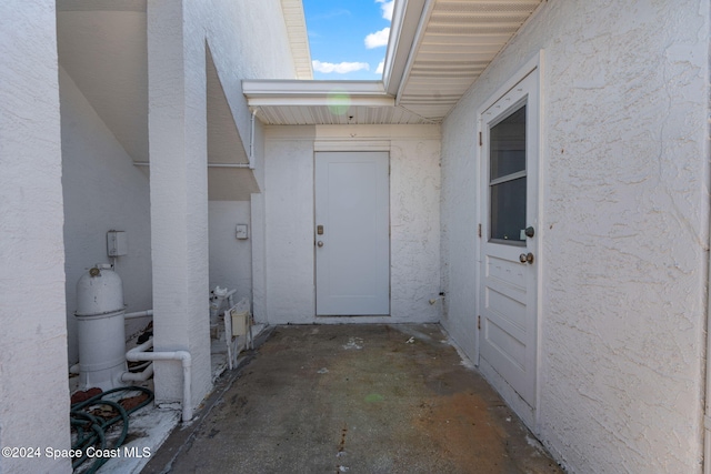 921 S Orlando Ave, Cocoa Beach, FL 32931 - doorway to property with stucco siding