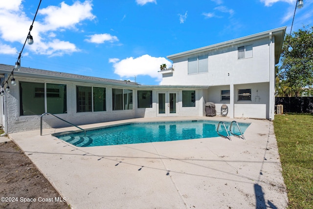 921 S Orlando Ave, Cocoa Beach, FL 32931 - swimming pool featuring a patio and french doors