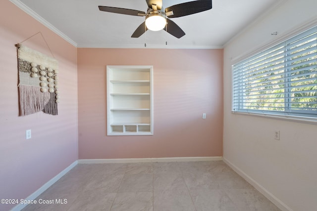 921 S Orlando Ave, Cocoa Beach, FL 32931 - unfurnished room featuring ornamental molding, ceiling fan, and baseboards