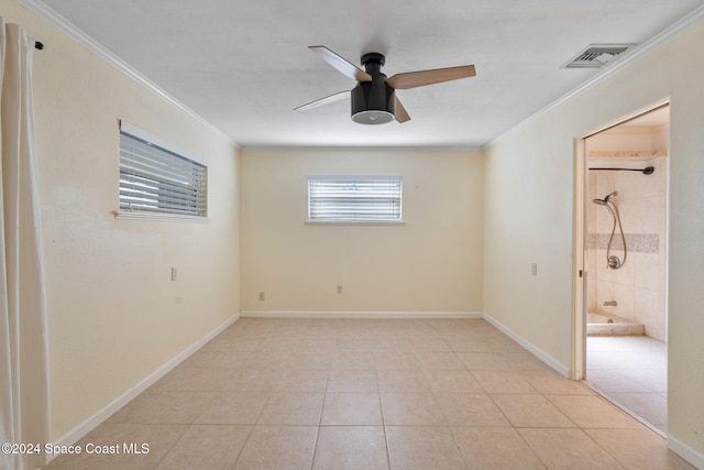 921 S Orlando Ave, Cocoa Beach, FL 32931 - unfurnished room with ornamental molding, ceiling fan, light tile patterned flooring, and baseboards