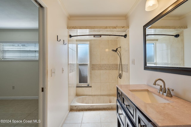 921 S Orlando Ave, Cocoa Beach, FL 32931 - full bath with tile patterned floors, tiled shower / bath, vanity, ornamental molding, and baseboards