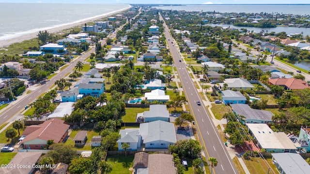921 S Orlando Ave, Cocoa Beach, FL 32931 - aerial overview of property's location with a large body of water and nearby suburban area