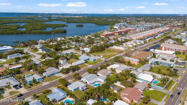 921 S Orlando Ave, Cocoa Beach, FL 32931 - aerial view of property and surrounding area featuring a nearby body of water and nearby suburban area