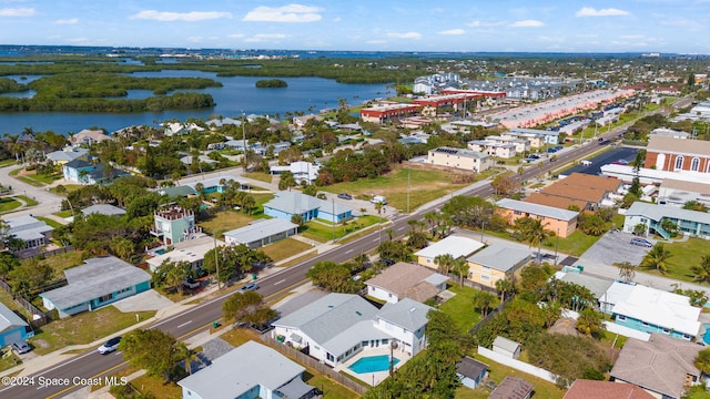921 S Orlando Ave, Cocoa Beach, FL 32931 - aerial overview of property's location with a large body of water and nearby suburban area