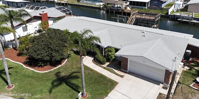 1700 Neptune Dr, Merritt Island, FL 32952 - aerial view of residential area with a large body of water