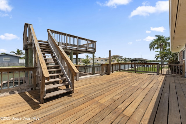 1700 Neptune Dr, Merritt Island, FL 32952 - deck featuring stairs and a water view