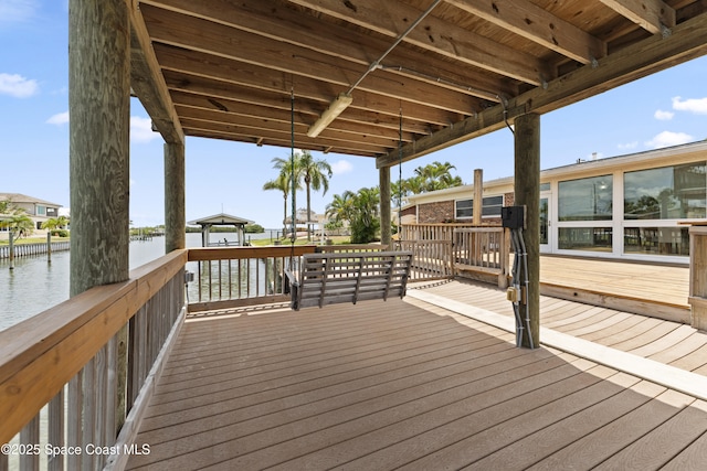 1700 Neptune Dr, Merritt Island, FL 32952 - wooden terrace with a water view