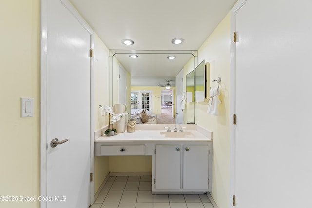 1700 Neptune Dr, Merritt Island, FL 32952 - ensuite bathroom featuring vanity, tile patterned floors, recessed lighting, baseboards, and a ceiling fan